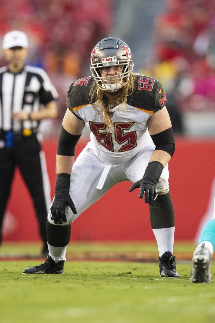 Tampa Bay Buccaneers guard Alex Cappa (65) reacts to the snap during a NFL  divisional playoff f …